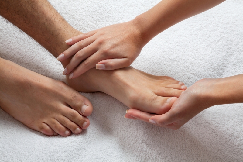 3583247-hands-massaging-feet